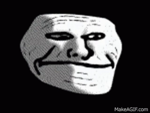 A Black And White Drawing Of A Troll Face With A Big Smile . GIF