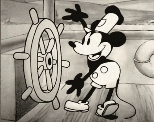 A Black And White Drawing Of Mickey Mouse With A Steering Wheel GIF