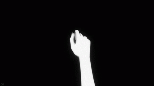 A Black And White Drawing Of Two People Holding Hands . GIF