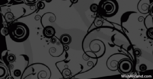 A Black And White Floral Pattern With The Website Wishafriend.com GIF
