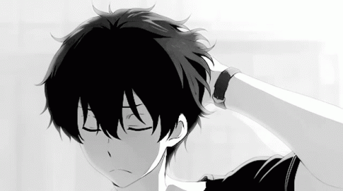A Black And White Image Of A Boy With His Eyes Closed GIF
