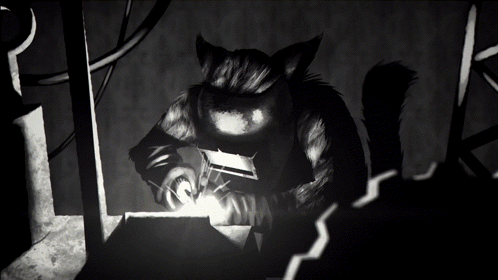 a black and white image of a cat welding