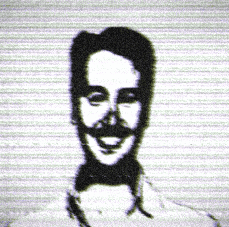 A Black And White Image Of A Man With A Mustache And Bow Tie GIF