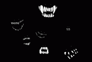 A Black And White Image Of A Monster 'S Mouth With Fangs GIF