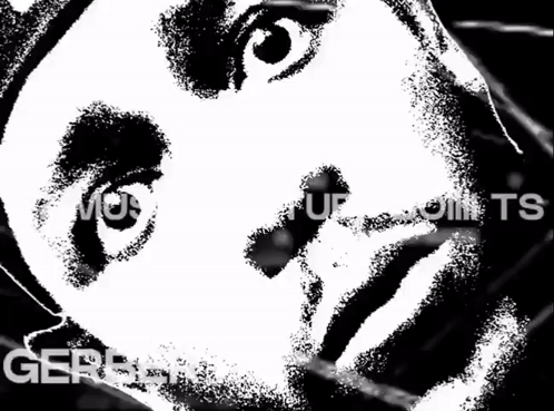 A Black And White Image Of A Person 'S Face With The Word Gerber In The Corner GIF