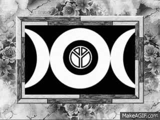 A Black And White Image Of A Triple Goddess Symbol With Roses In The Background GIF
