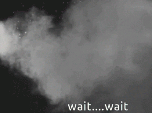 A Black And White Image Of Smoke With The Words Wait Wait GIF