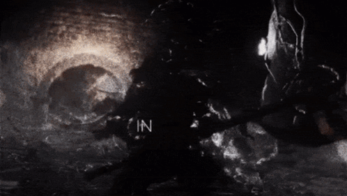 A Black And White Image With The Words " In Death " On It GIF
