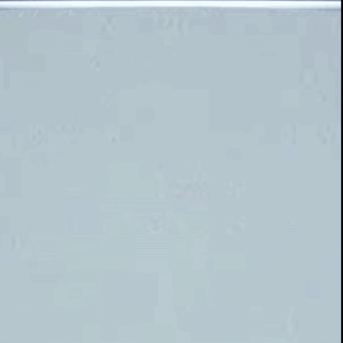 A Black And White Mask With Tears Coming Out Of Its Eyes GIF