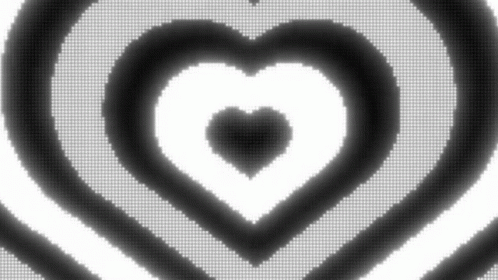 A Black And White Optical Illusion With Hearts In The Middle . GIF