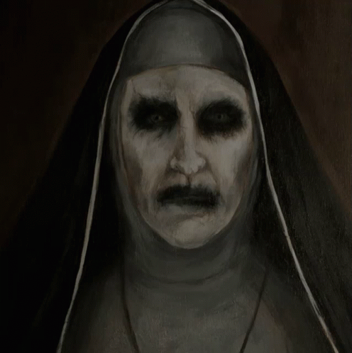 A Black And White Painting Of A Nun With A Very Scary Face GIF