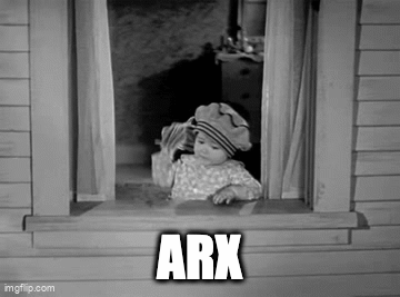 A Black And White Photo Of A Baby In A Hat Looking Out Of A Window With The Word Arx Above Him . GIF