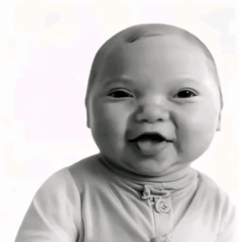 Black And White Photo Of Smiling Baby GIF