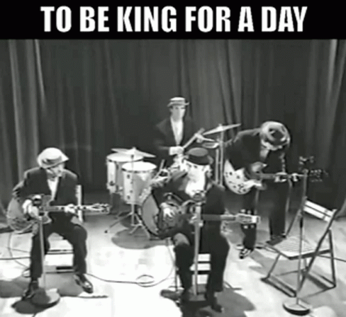 A Black And White Photo Of A Band With The Words " To Be King For A Day " GIF