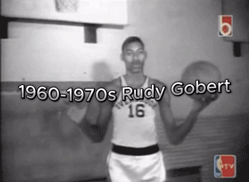 A Black And White Photo Of A Basketball Player With The Name Rudy Gobert GIF