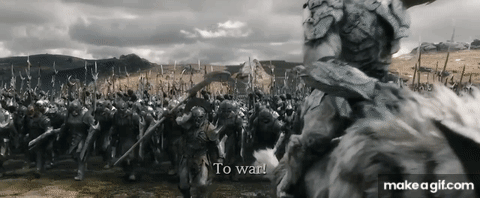 A Black And White Photo Of A Battle Scene With The Words `` To War '' Written In The Corner . GIF