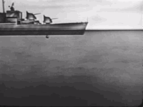A Black And White Photo Of A Boat Floating On Top Of A Large Body Of Water . GIF