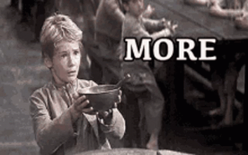 A Black And White Photo Of A Boy Holding A Bowl With The Word More Written On It . GIF