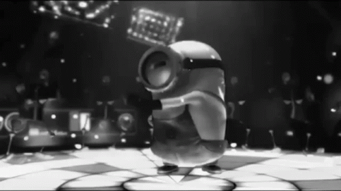 A Black And White Photo Of A Cartoon Character Dancing On A Dance Floor . GIF