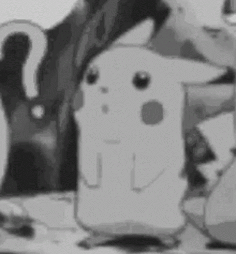 A Black And White Photo Of A Cartoon Character Standing Next To A Person . GIF