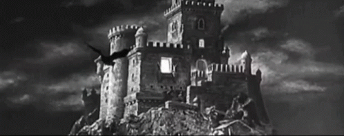 A Black And White Photo Of A Castle On Top Of A Hill With The Number 10 On The Top GIF