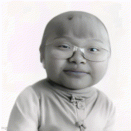 A Black And White Photo Of A Child Wearing Glasses And A Turtleneck GIF