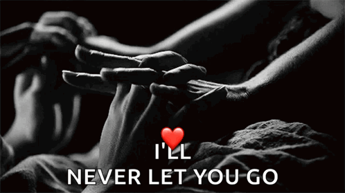 A Black And White Photo Of A Couple Holding Hands With The Words " I 'Ll Never Let You Go " Below Them GIF
