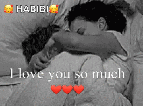 A Black And White Photo Of A Couple Hugging With The Words " I Love You So Much " On The Bottom GIF