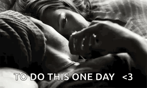 A Black And White Photo Of A Couple Sleeping On A Bed With The Words `` To Do This One Day < 3 '' . GIF