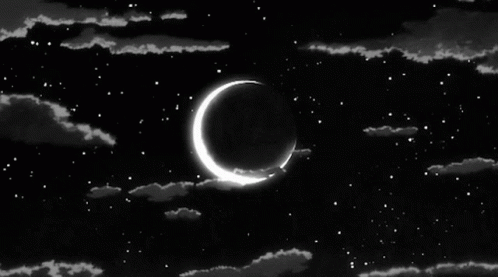 A Black And White Photo Of A Crescent Moon In A Night Sky GIF