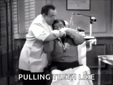 A Black And White Photo Of A Dentist Pulling Teeth Of A Patient . GIF