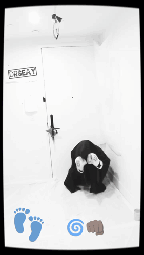 A Black And White Photo Of A Door That Says Drseay On It GIF