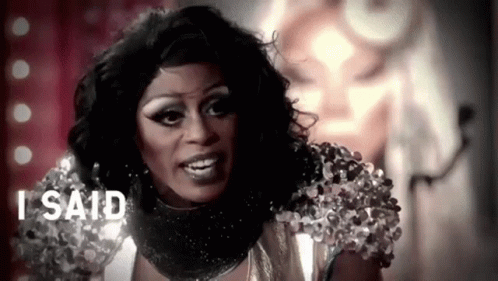 A Black And White Photo Of A Drag Queen With The Words I Said Behind Her . GIF
