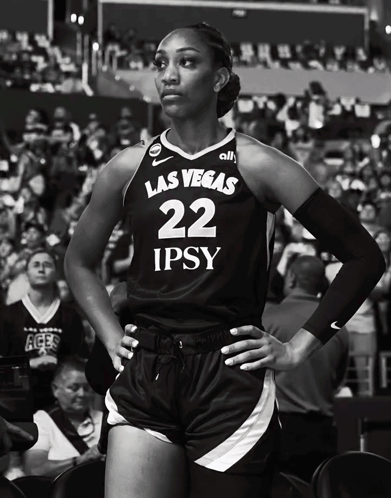 A Black And White Photo Of A Female Basketball Player Wearing A Las Vegas 22 Jersey GIF