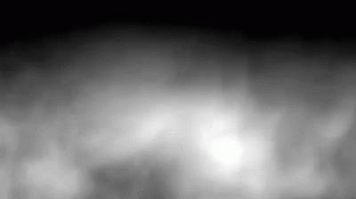 A Black And White Photo Of A Foggy Sky GIF