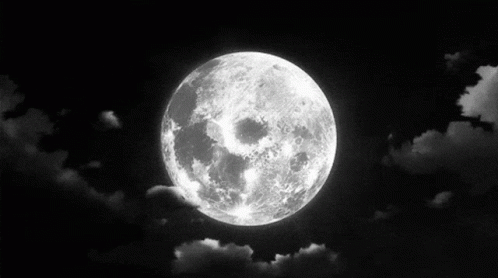 A Black And White Photo Of A Full Moon In The Night Sky GIF
