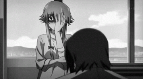 A Black And White Photo Of A Girl Covering Her Eyes GIF