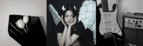 A Black And White Photo Of A Girl With Angel Wings , A Guitar And An Amplifier . GIF