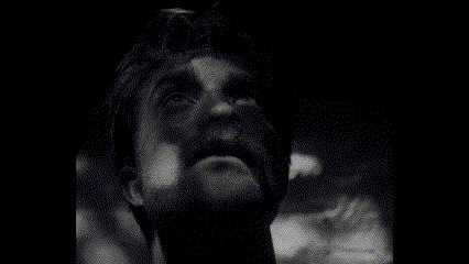 A Black And White Photo Of A Grid With Squares In It GIF