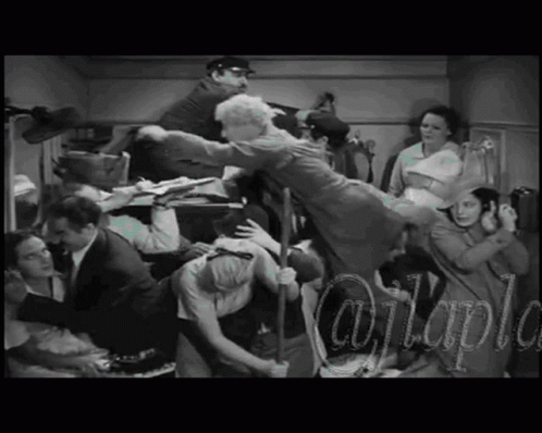 A Black And White Photo Of A Group Of People With A Caption That Says @Itaple GIF
