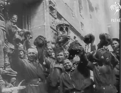 A Black And White Photo Of A Group Of People With The Word Pathe On The Bottom Right GIF