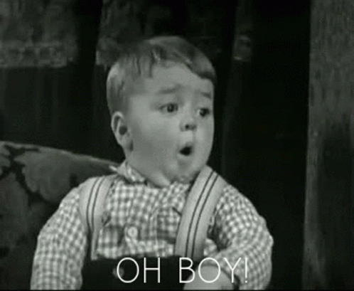 A Black And White Photo Of A Little Boy Making A Funny Face And Saying Oh Boy . GIF