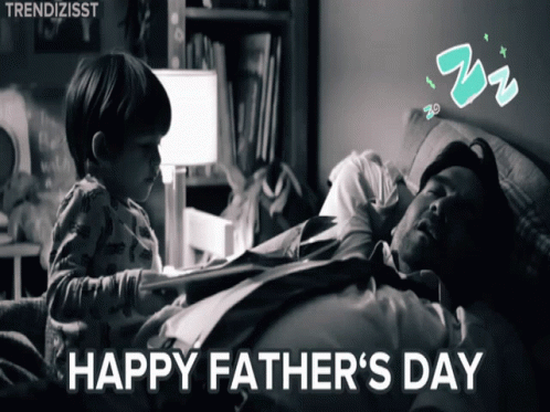 A Black And White Photo Of A Little Boy Playing With A Man Laying In Bed With The Words Happy Father 'S Day Below It GIF