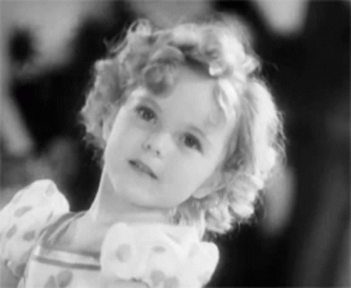 A Black And White Photo Of A Little Girl GIF