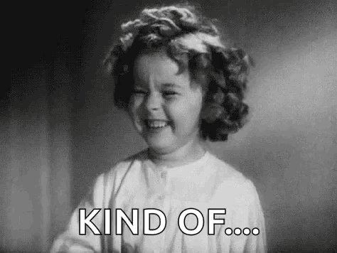 A Black And White Photo Of A Little Girl Laughing And Saying `` Kind Of ... '' . GIF