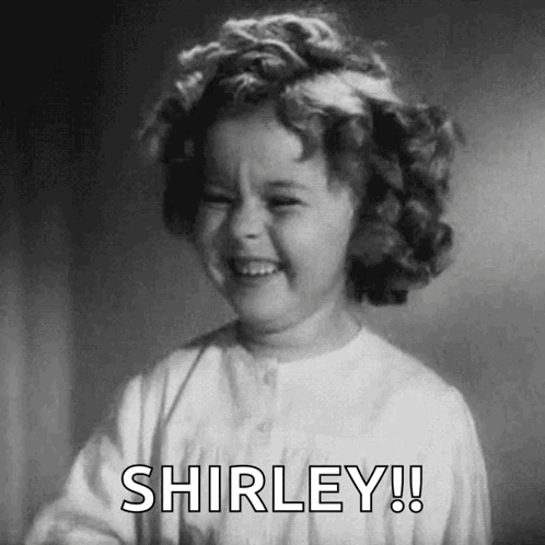 A Black And White Photo Of A Little Girl Laughing With The Words Shirley ! GIF