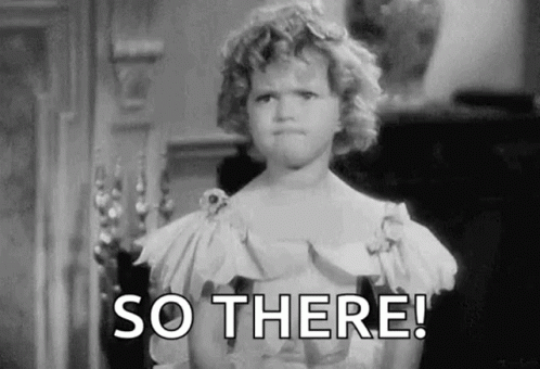 A Black And White Photo Of A Little Girl Making A Face And Saying `` So There ! '' GIF