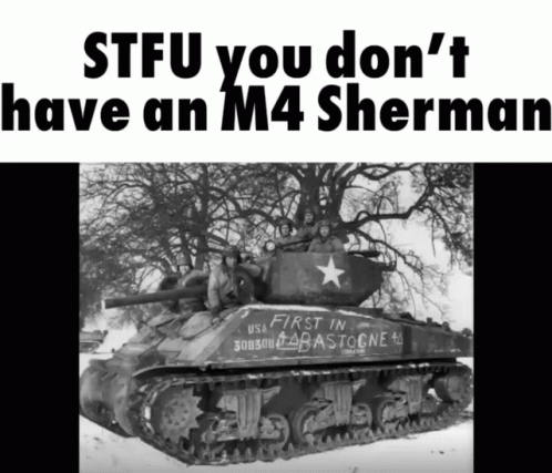 A Black And White Photo Of A M4 Sherman Tank GIF