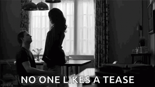 A Black And White Photo Of A Man And A Woman Having Sex In A Living Room . GIF