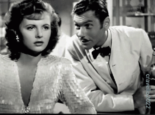 a black and white photo of a man and a woman taken by crawford 2002